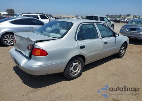 2001 Toyota Corolla Ce/Le/S из США, поврежденный, VIN 1NXBR12E31Z452253